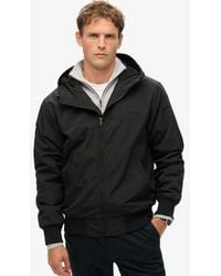Superdry - & Co Classic Embroidered Logo Surplus Nylon Hooded Bomber Jacket - Lyst