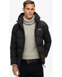 Superdry - Wijdvallende Pufferjas Met Capuchon - Lyst