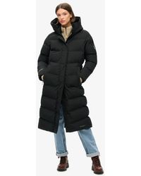 Superdry - Ladies Slim Fit Embroidered Logo City Chevron Padded Longline Coat - Lyst