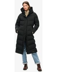 Superdry - Ladies Slim Fit Embroidered Logo City Chevron Padded Longline Coat - Lyst