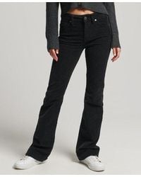 Superdry - Slimfit Corduroy Jeans Met Middelhoge Taille En Wijduitlopende Pijpen - Lyst