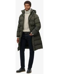 Superdry - Lange Pufferjas Met Capuchon - Lyst