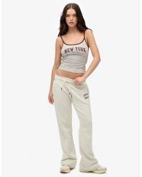 Superdry - Athletic Essentials joggingbroek Met Lage Taille En Wijde Pijpen - Lyst