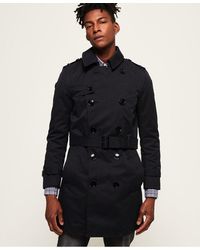 Men's Superdry Raincoats and trench coats from $134 | Lyst