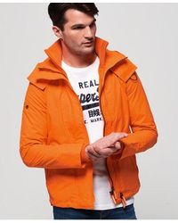 orange superdry coat