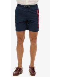 Superdry - & Co Sport Graphic 17-inch Recycled Swim Shorts - Lyst
