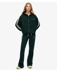 Superdry - & Co Athletic Stripe Flare joggers - Lyst