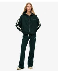 Superdry - Athletic joggingbroek Met Wijde Pijpen En Strepen - Lyst