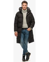 Superdry - Lange Pufferjas Met Capuchon - Lyst