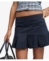 Superdry - Bench X & Co Bench Logo Pleated Peached Mini Skirt - Lyst