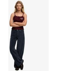 Superdry - & Co Mid Rise baggy Jumbo Cord Pants - Lyst