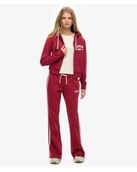 Superdry - Athletic joggingbroek Met Wijde Pijpen En Strepen - Lyst