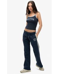 Superdry - & Co Athletic Essentials Stripe Flare joggers - Lyst