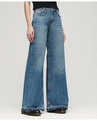 Superdry - Jeans Met Uitlopende Pijpen En Onafgewerkte Zoom - Lyst