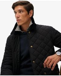 Superdry - Gewatteerde Estate Coach Jas - Lyst
