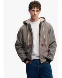 Superdry - & Co Carhartt Reworked Hooded Jacket - Lyst