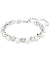 Swarovski - Pulsera tennis matrix, perla de cristal, talla redonda, blanca, baño de rodio - Lyst