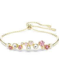 Swarovski - Bracelet constella, tailles variées, multicolore, placage de ton or - Lyst