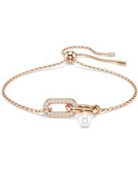 Swarovski - Pulsera constella, perla de cristal, talla redonda, blanca, baño tono oro rosa - Lyst