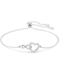 Swarovski - Braccialetto infinity - Lyst