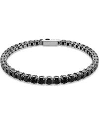 Swarovski - Pulsera tennis matrix, talla redonda, negra, baño de rutenio - Lyst