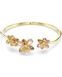 Swarovski - Bracciale rigido idyllia, taglio misto, fiore, multicolore, placcato color oro - Lyst
