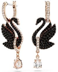 Swarovski - Swan Drop Earrings, Swan, Rose-Tone Plated - Lyst