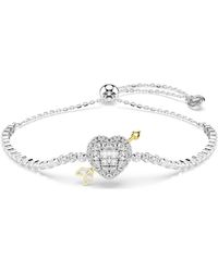 Swarovski - Braccialetto idyllia, taglio misto, cuore con freccia - Lyst