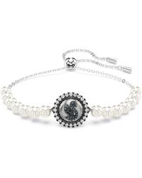 Swarovski - Braccialetto swan, cigno - Lyst