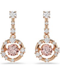 Swarovski - Pendientes constella, talla redonda, dancing stone - Lyst