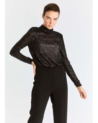 roman black jumpsuit