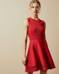 mizalia highland wrap detail skater dress