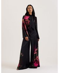 Ted Baker - Floral Print Satin Wide Leg Jumpsuit With Tie Neck - Lyst