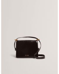 Ted Baker - Ccamil Patent Leather Belted Detail Crossbody Bag - Lyst