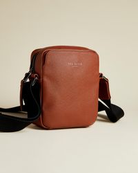 ted baker wowee embossed messenger bag