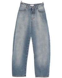 Alaïa - Round Denim Jeans - Lyst