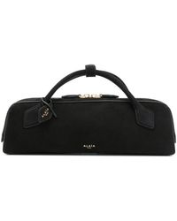 Alaïa - Le Teckel Leather Clutch - Lyst