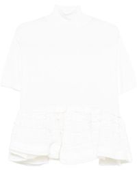 Alaïa - Wool Peplum Top - Lyst
