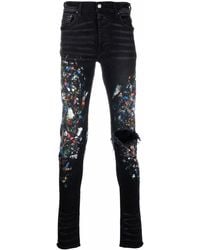 Amiri Jeans skinny con effetto vernice - Nero