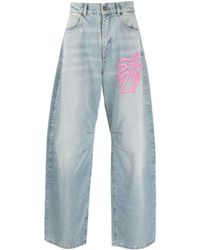 Palm Angels - Jeans a gamba ampia con stampa - Lyst