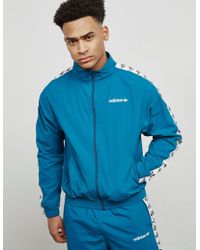 teal adidas tracksuit