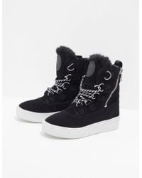dkny snakeskin boots