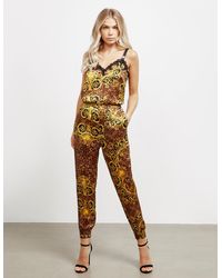 Versace Jeans Couture Jumpsuits and rompers for Women | Online Sale up to  89% off | Lyst