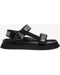 Moschino - Logo Tape Flat Sandals - Lyst