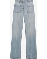 Valentino - Logo Patch Washed Denim Pants - Lyst