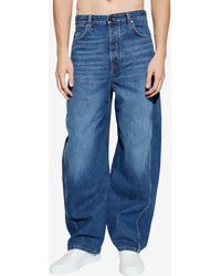 Givenchy - Logo Patch Wide-Leg Jeans - Lyst