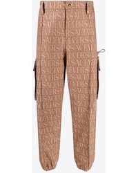 Versace - All-Over Logo Cargo Pants - Lyst
