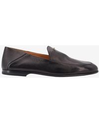 Tod's - Embossed Logo Leather Loafers - Lyst
