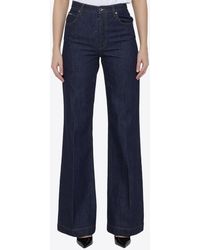 Dolce & Gabbana - Logo-Plate Flared Jeans - Lyst