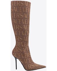 Versace - 100 All-Over Logo Knee-High Boots - Lyst